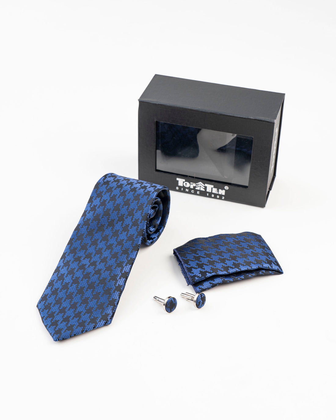 Blue and black patterned tie set with rolled necktie
