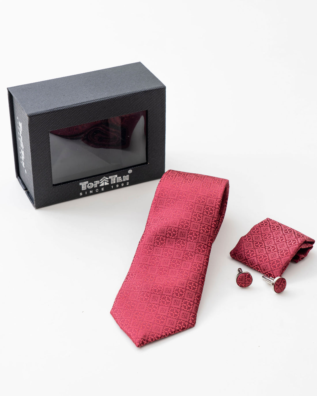 Pink geometric patterned tie set with matching accessories and gift box
