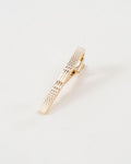Diamond-textured tie clip close-up