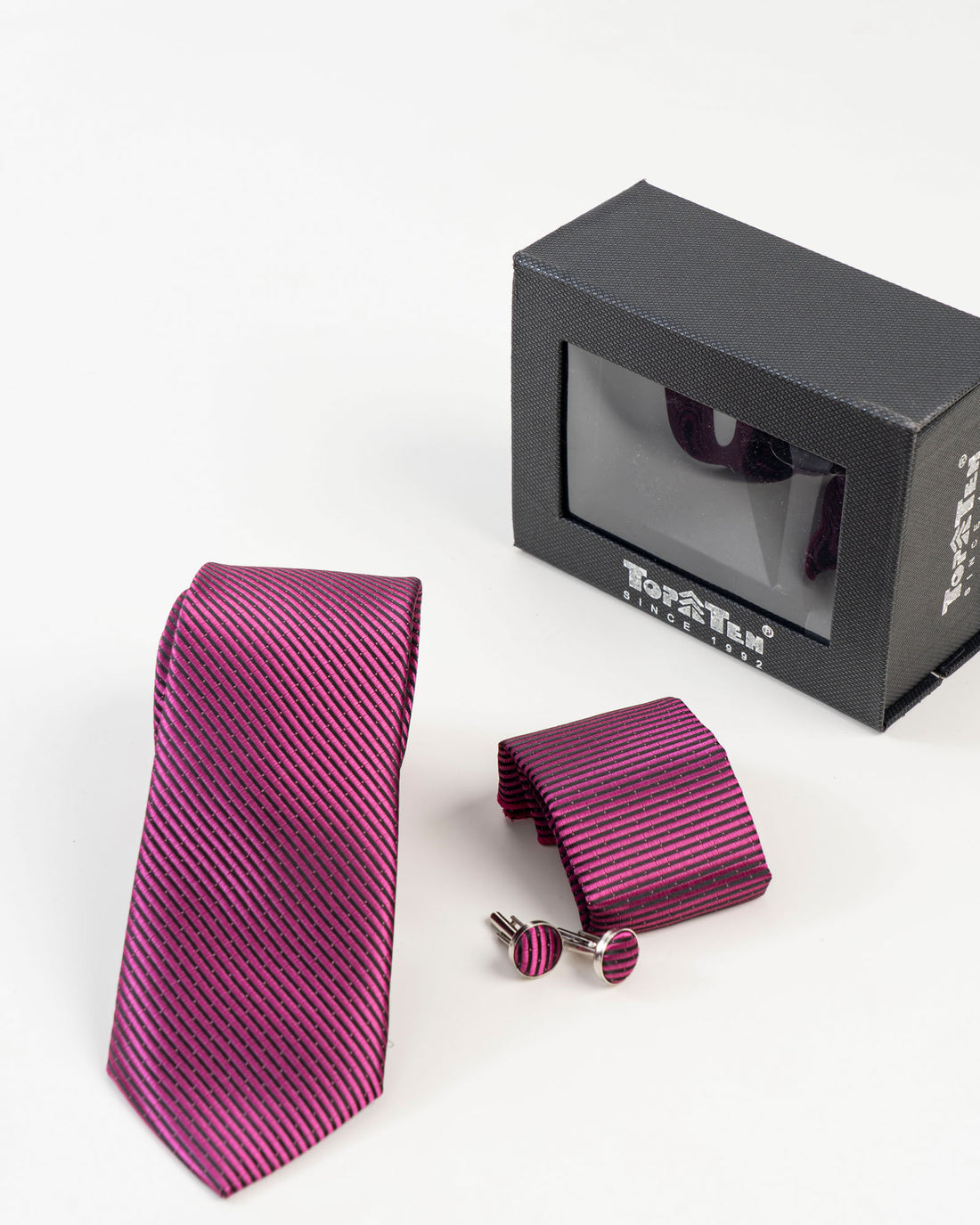 Pink and navy diagonal striped tie set with matching pocket square and cufflinks