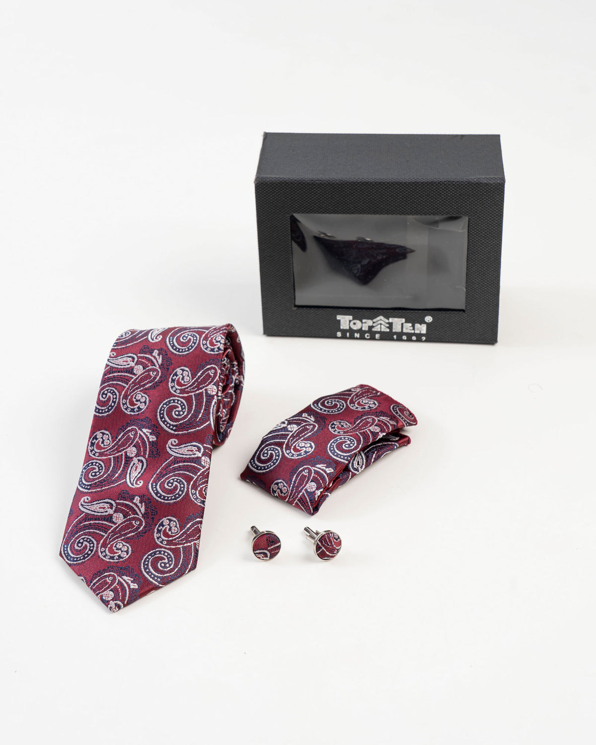 Close-up of burgundy paisley patterned tie