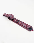 Full view of burgundy paisley patterned tie