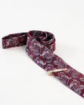 Diamond-textured tie clip paired with a burgundy paisley tie