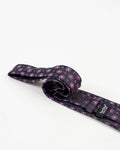 Full view of black and purple circular patterned tie