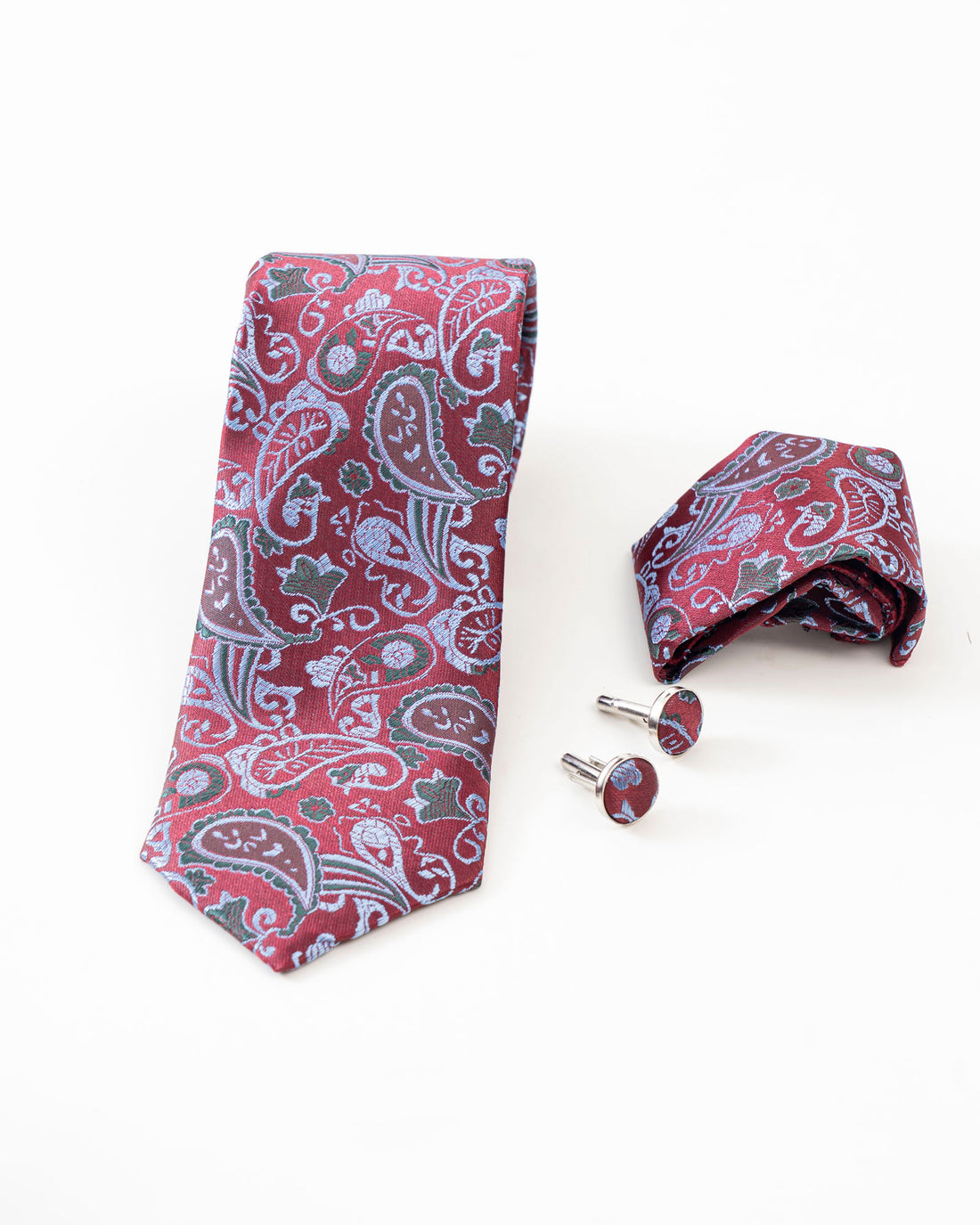 Maroon paisley patterned tie with matching pocket square and cufflinks