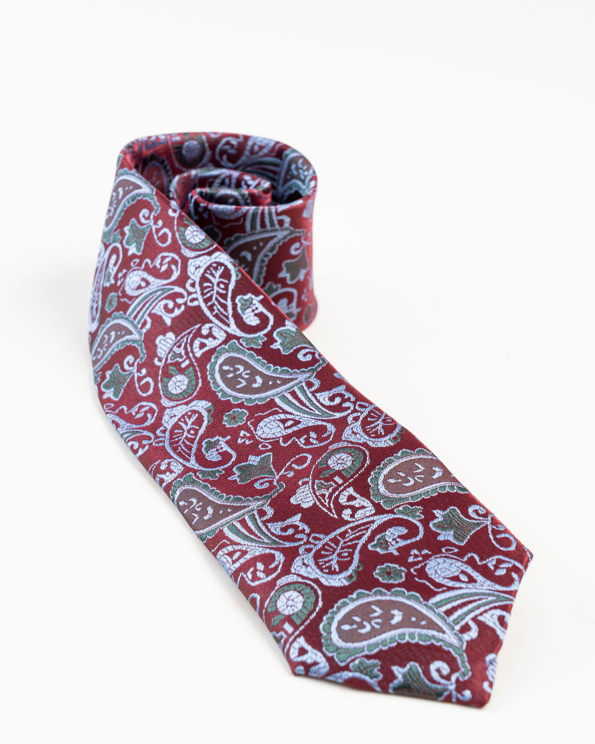 Maroon paisley patterned tie set with matching pocket square and cufflinks
