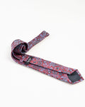 Close-up of maroon paisley patterned tie fabric