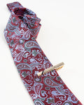 Black line gold-tone tie clip shown with a burgundy paisley tie